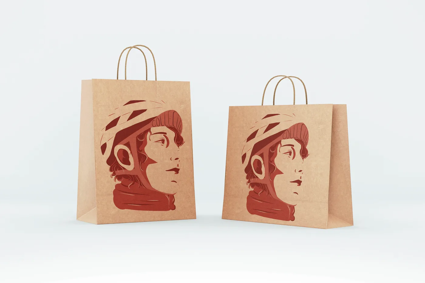 Two kraft paper food bags carrying the red Khora courier helmet identity mark.